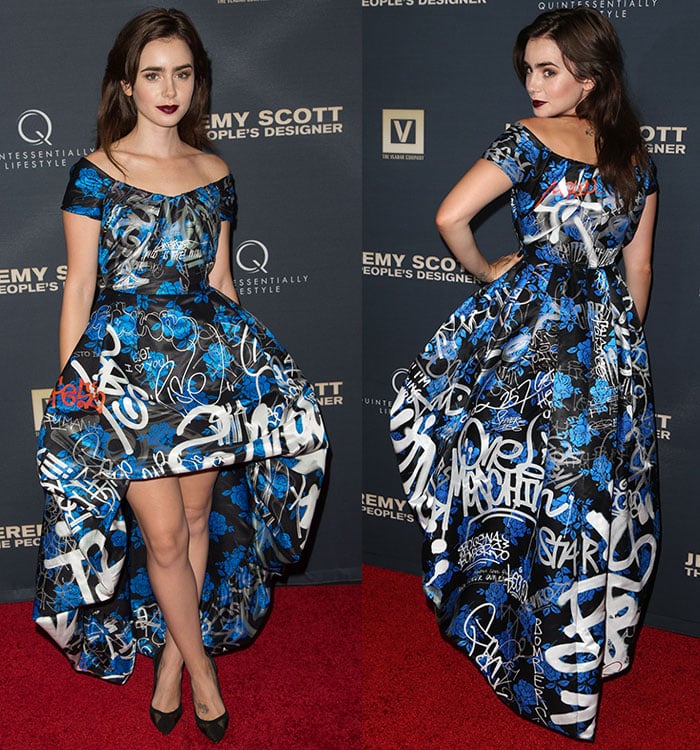 The back of Lily Collins’ Moschino dress reveals its full dramatic flair, showcasing the vibrant graffiti print cascading into a voluminous high-low train