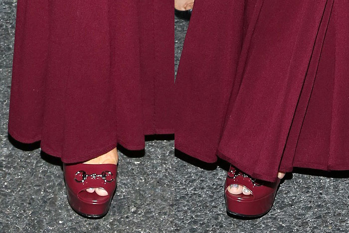 Mariah Carey's Bordeaux Gucci "Claudie" platform sandals peek out from beneath her matching gown