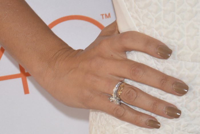 Penélope Cruz showing off her rings and manicure