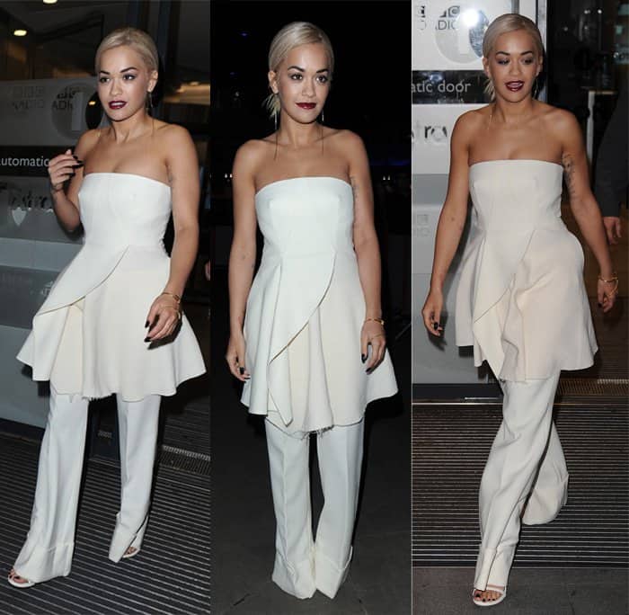 Rita Ora showcases a sophisticated dress-over-pants look with a white strapless ensemble by Stella McCartney