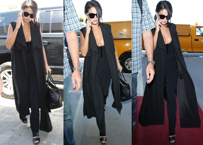 Selena Gomez chats on the phone as she strolls through LAX in a cleavage-baring all-black outfit