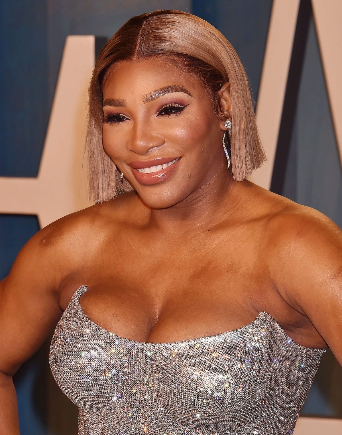Serena Williams styled her sparkling dress with silver drop earrings and a short-cut bob