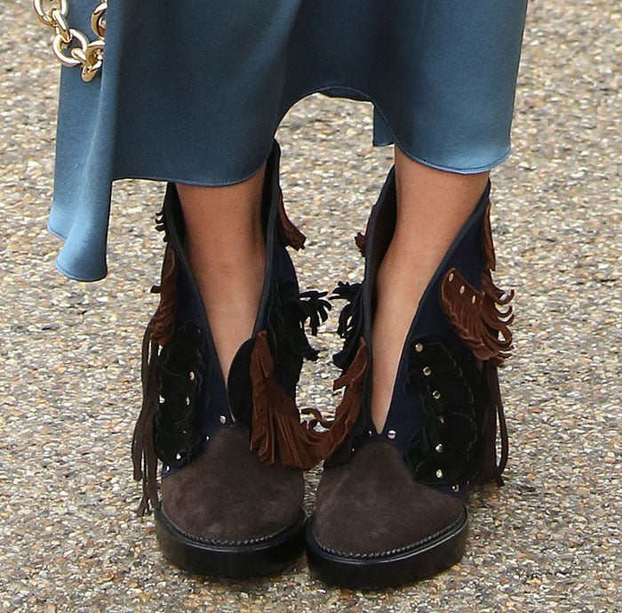 Suki Waterhouse shows off the fringe detailing on her "Lilybell" booties