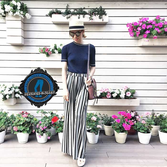 Valeriya shows how to wear striped palazzo pants with a knitted top