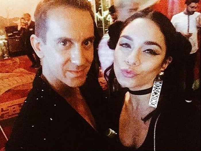 Vanessa Hudgens goofs around and takes a selfie with fashion designer Jeremy Scott at the premiere of "Jeremy Scott: The People's Designer"