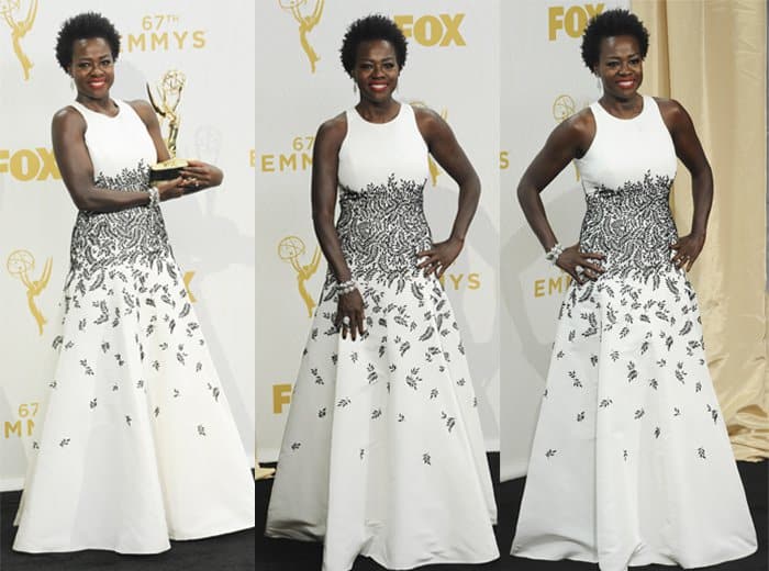 Viola Davis radiates sophistication in a white Carmen Marc Valvo gown, featuring intricate black detailing that adds a dramatic contrast to her timeless look
