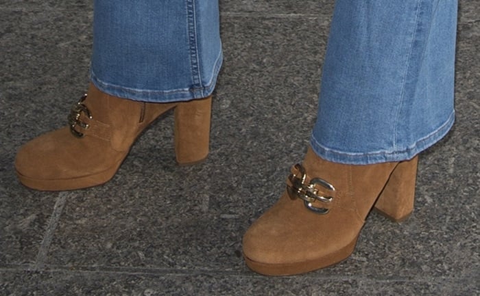 Bella Thorne completes her outfit with a pair of TopShop loafer boots on her feet