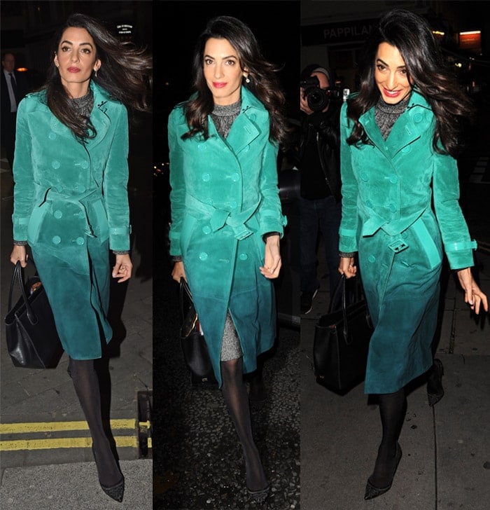 Amal Clooney totes a Dolce & Gabbana handbag and flaunts her legs in stockings and pumps