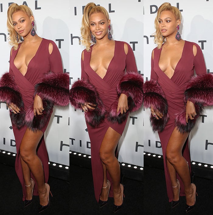 Beyonce wears her hair in a high ponytail on the black carpet