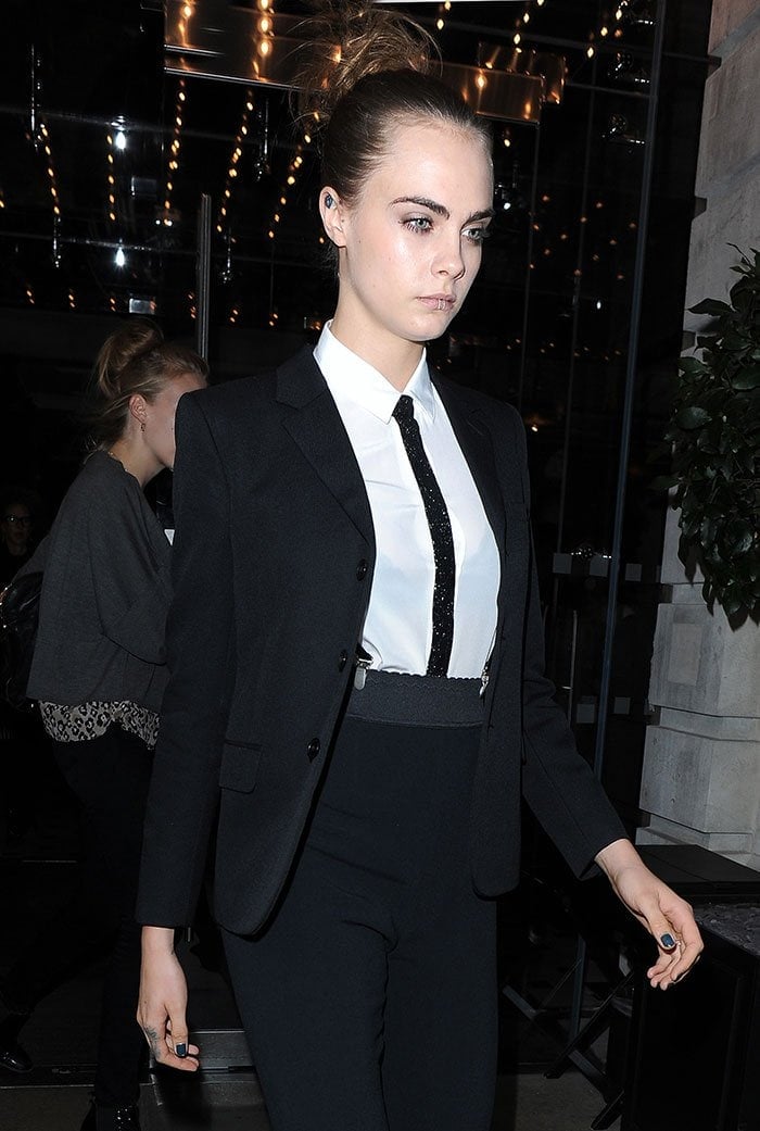 Cara Delevingne in a monochrome trouser suit