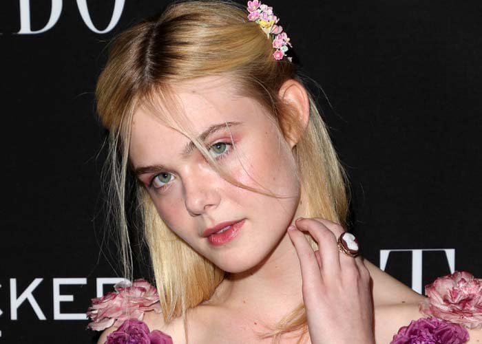 Elle Fanning wears flowers in her blonde hair