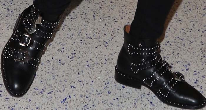 Emma Roberts wears a pair of studded Givenchy boots on her feet