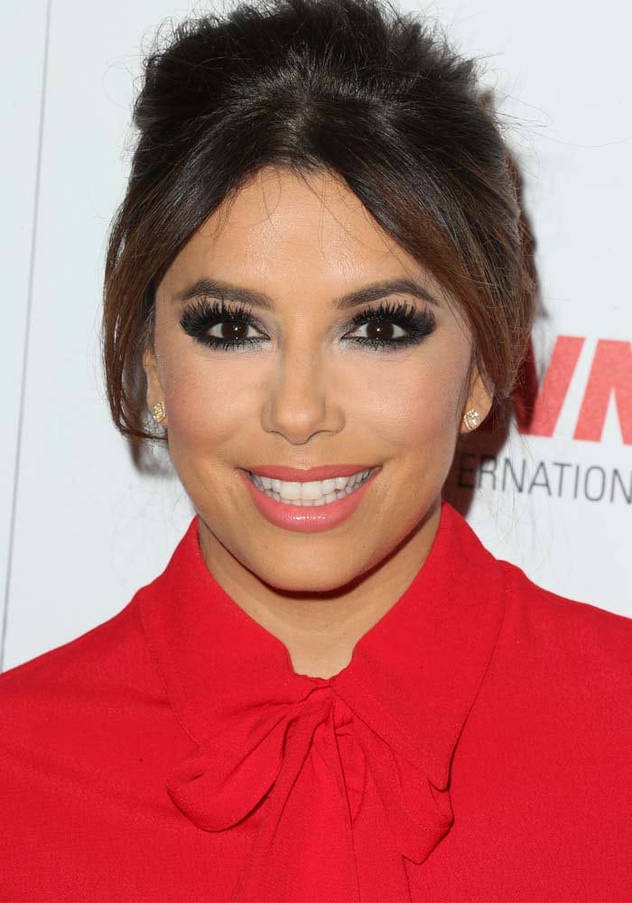 Eva Longoria wears her hair back at the International Women's Media Foundation Courage Awards