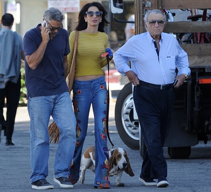 George Clooney shows his Shiite Muslim father–in–law Ramzi Alamuddin and his wife Amal Clooney around the set of 'Suburbicon'