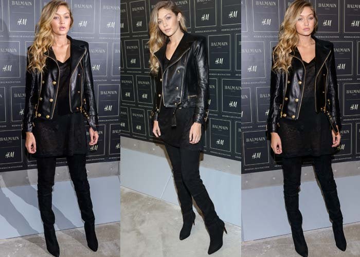 Gigi Hadid rocks a sleek black leather jacket, matching top, and over-the-knee boots for a chic, all-black ensemble