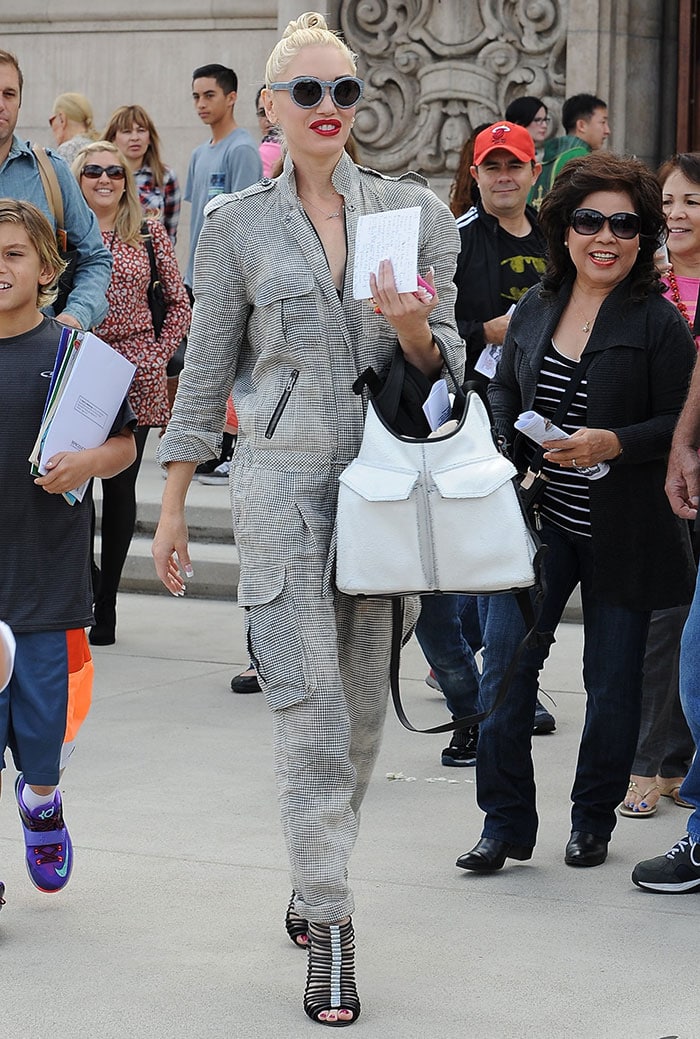 Gwen Stefani wears a long-sleeved checked jumpsuit as she strolls through Studio City