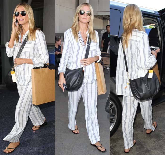 Heidi Klum wears a striped pajama set at Los Angeles International Airport