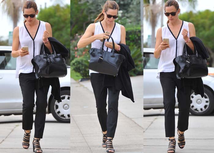 Jennifer Garner toting a black Tod's small cape bag