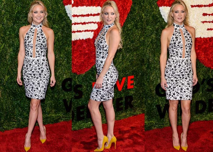 Kate Hudson wears a floral-print dress from Michael Kors on the red carpet