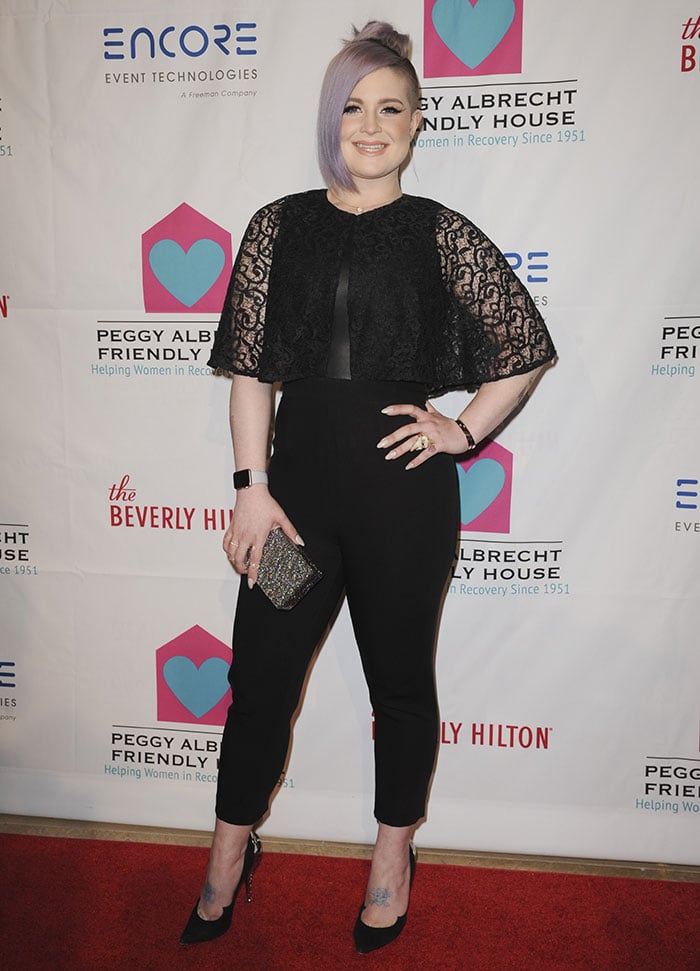 Kelly Osbourne shows off her black leather-and-lace ensemble on the red carpet of the Peggy Albrecht Friendly House luncheon