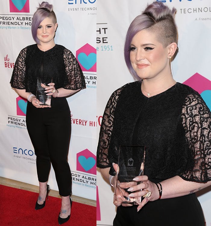 Kelly Osbourne shows off a tattoo on her skull, barely visible under her lavender-hued undercut hair