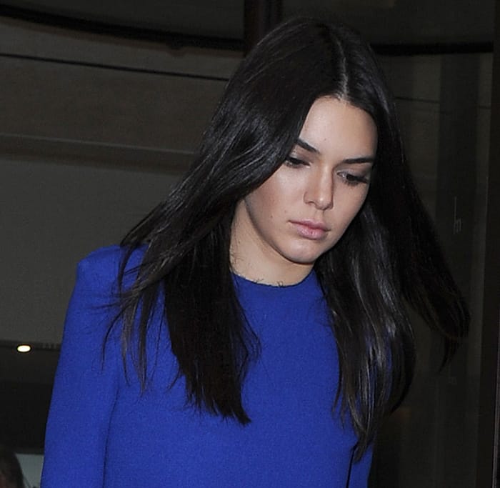 Kendall Jenner's minimalist makeup perfectly complements her vibrant blue ensemble