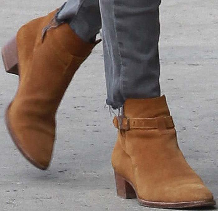 Kourtney Kardashian wears Saint Laurent boots