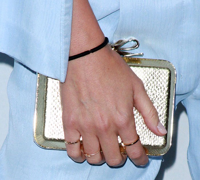 Miranda Kerr totes a Christian Louboutin Fiocco embellished clutch