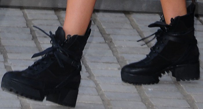 Miranda Kerr completes her outfit with a pair of Louis Vuitton boots