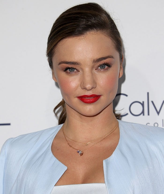 Miranda Kerr pulled her hair back into a side-parted ponytail at the 22nd Annual Elle Women in Hollywood Awards held at the Four Seasons Hotel in Los Angeles on October 19, 2015