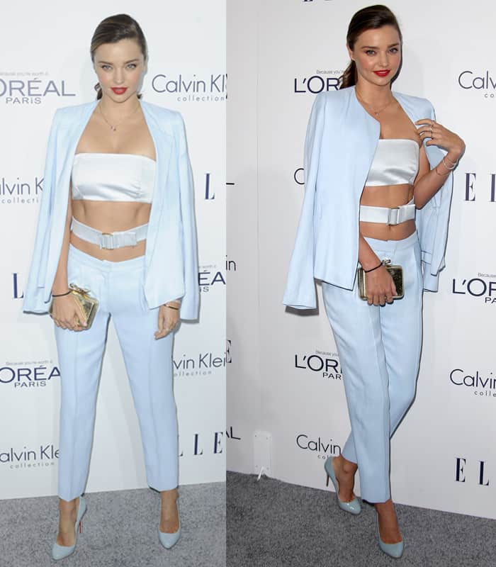 Miranda Kerr stuns in a powder blue Calvin Klein pantsuit, showcasing her toned midriff with a matching bandeau top at the ELLE Women in Hollywood event