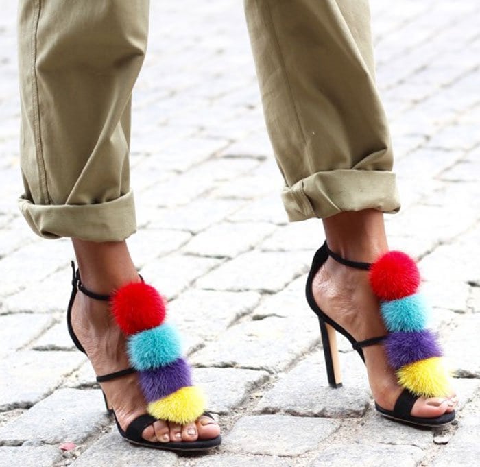 Monroe showed off her feet in colorful pompom sandals