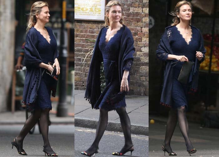 Reneé Zellweger wears a blue lace dress and a shawl in London while filming for the latest "Bridget Jones" movie