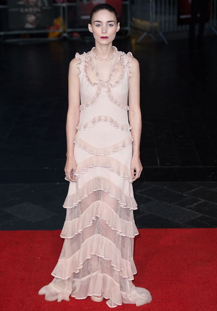 Rooney Mara wore a mesmerizing semi-sheer ruffled Alexander McQueen Spring 2016 dress in a delicate shade of pale pink, which beautifully accentuated her slender figure