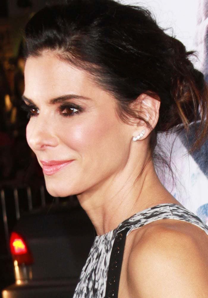 Sandra Bullock with her hair back at the premiere of "Our Brand Is Crisis"