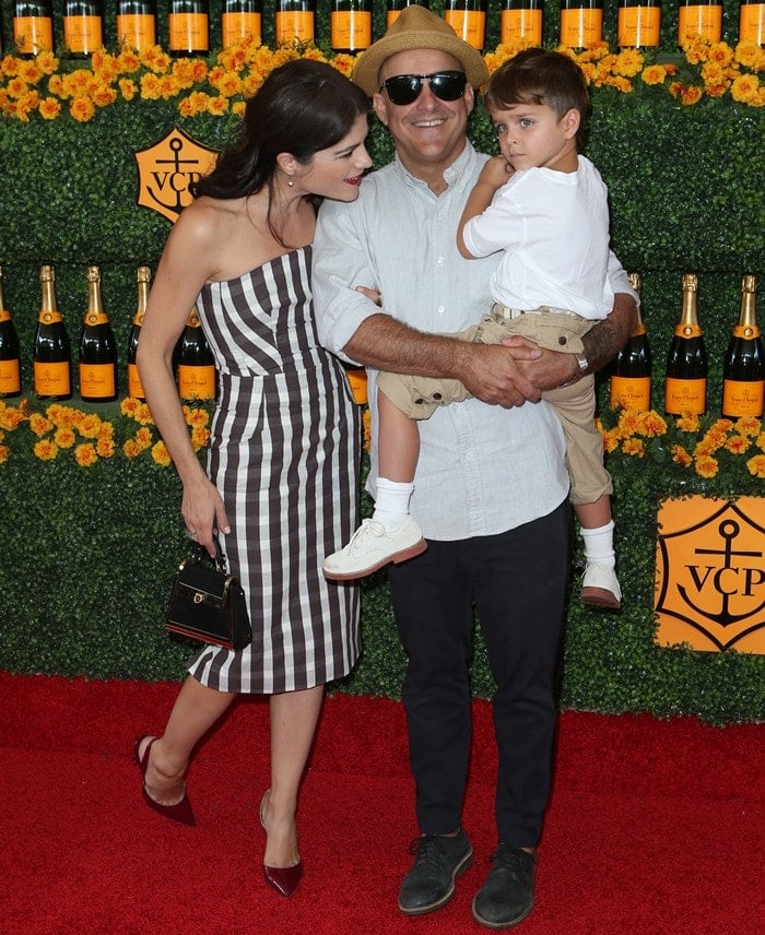 Selma Blair, posing with Jason Bleick and her son Arthur Bleick, at the 2015 Veuve Clicquot Polo Classic held at Will Rogers State Historic Park in Los Angeles on October 17, 2015