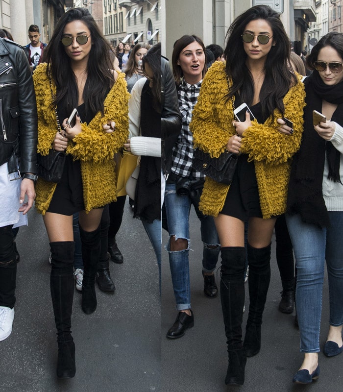 Shay Mitchell styles her yellow mustard knit cardigan from For Love & Lemons with black suede Stuart Weitzman over-the-knee boots
