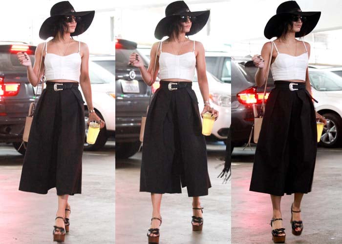 Vanessa Hudgens grabs lunch to go in a white crop top paired with black culottes