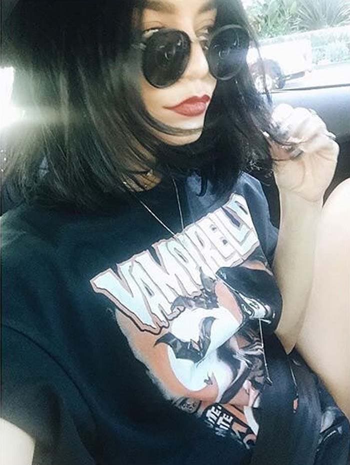Vanessa Hudgens rocks a bold look in round sunglasses and a vintage-inspired Vamprella graphic tee