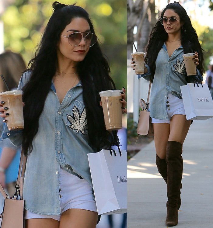 Vanessa Hudgens styles her long brown hair into a half-updo as she strolls through Los Angeles