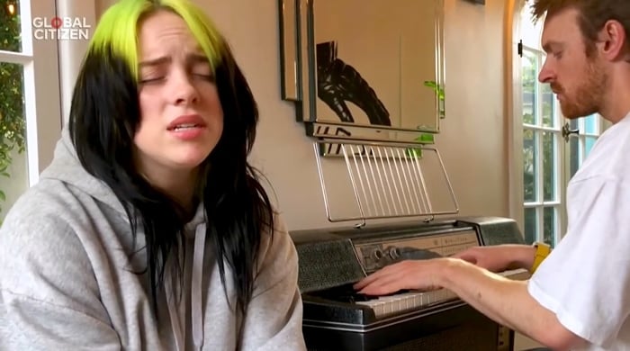Billie Eilish, pictured performing with her brother Finneas O’Connell during the One World: Together at Home special on April 18, 2020, was inspired by Katharine McPhee's 2007 song Over It”
