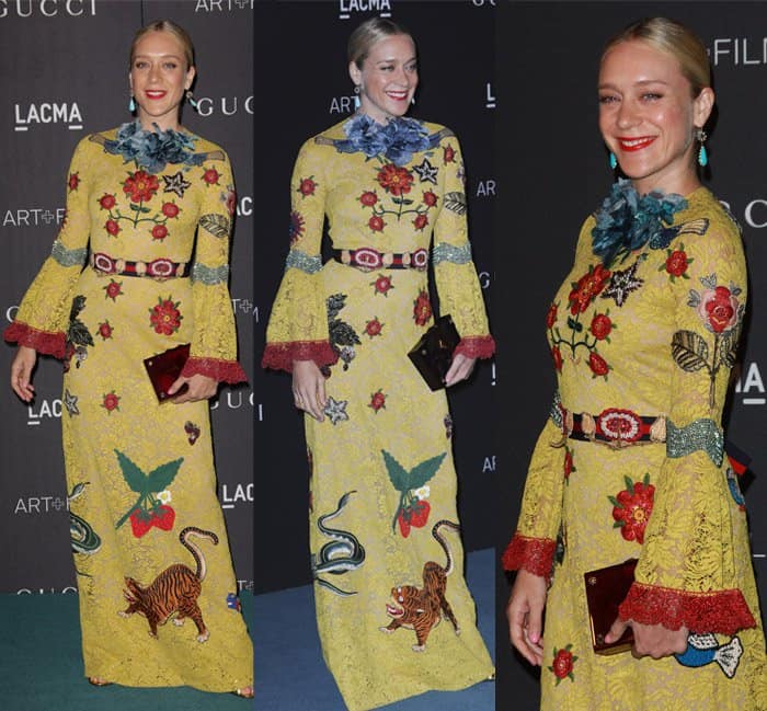 Chloë Sevigny stands out in a vibrant Gucci lace dress adorned with intricate floral, animal, and fruit motifs at the LACMA 2015 Art + Film Gala