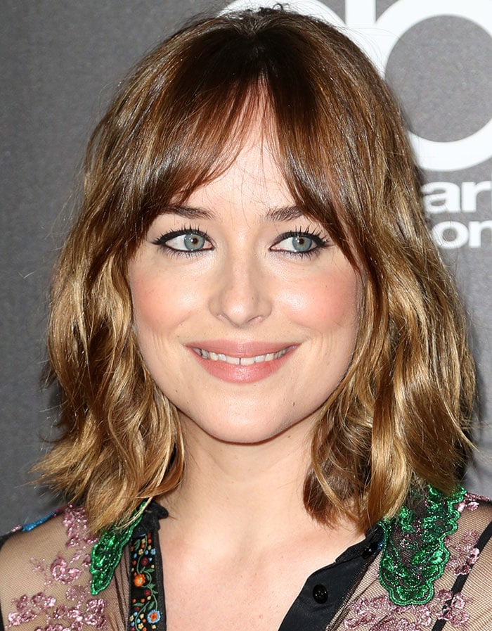 Dakota Johnson wears her hair down at the 19th Annual Hollywood Film Awards