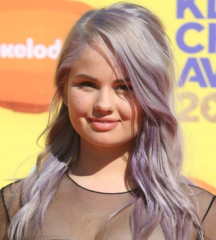 Debby Ryan flaunts her septum piercing and nose ring at the Nickelodeon Kids' Choice Awards