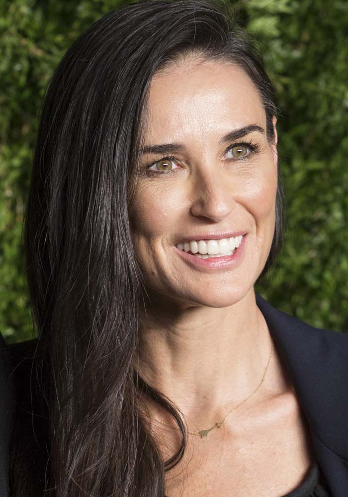 Demi Moore wears her dark hair down at the 2015 CFDA Vogue Fashion Fund Awards