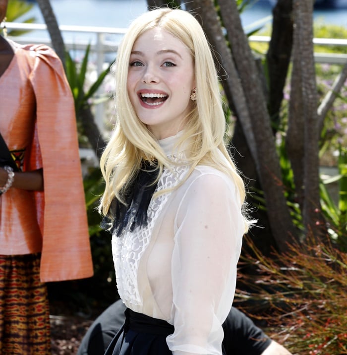 Elle Fanning was thinking about all her money while stepping out for the jury photocall during the 2019 Cannes Film Festival