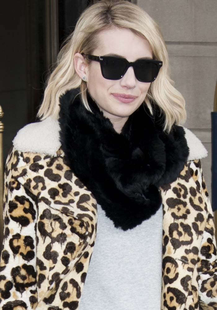 Emma Roberts wears her blonde hair down as she leaves her New York hotel