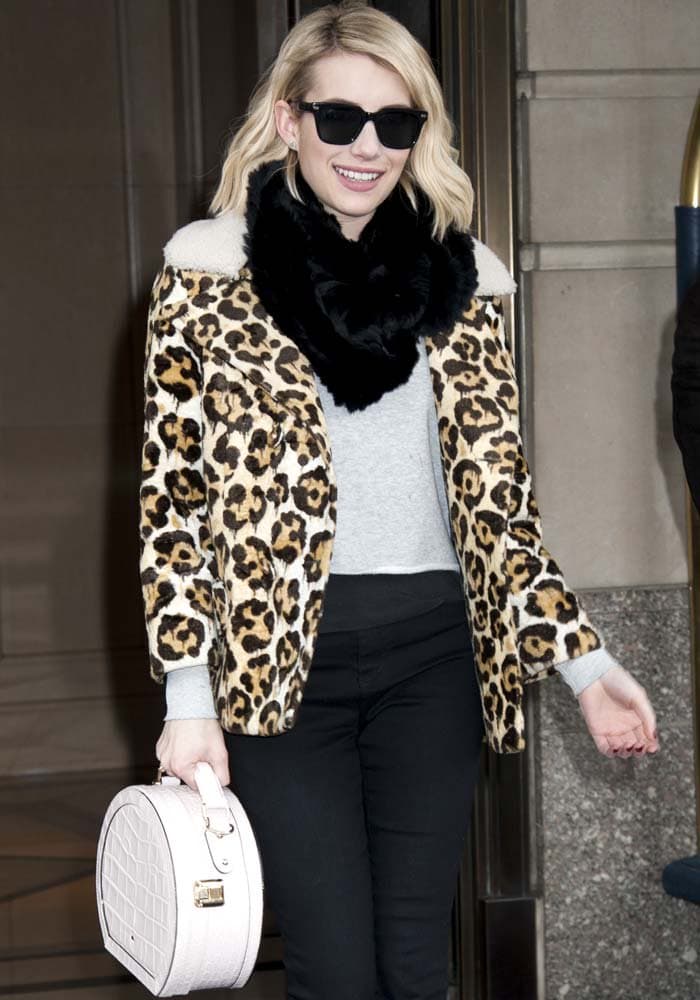 Emma Roberts carries a Kate Spade bag