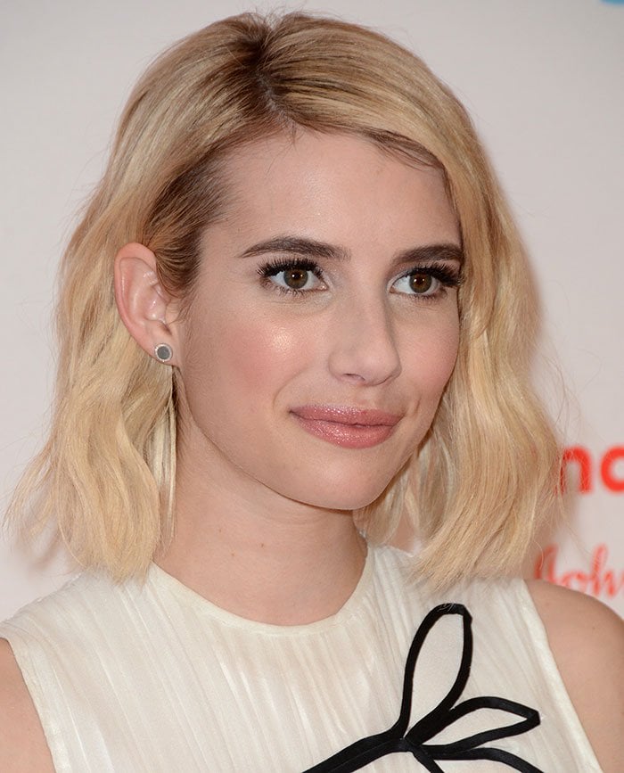 Emma Roberts wears her hair down at Johnson & Johnson's “Donate A Photo Holiday Kick-off”