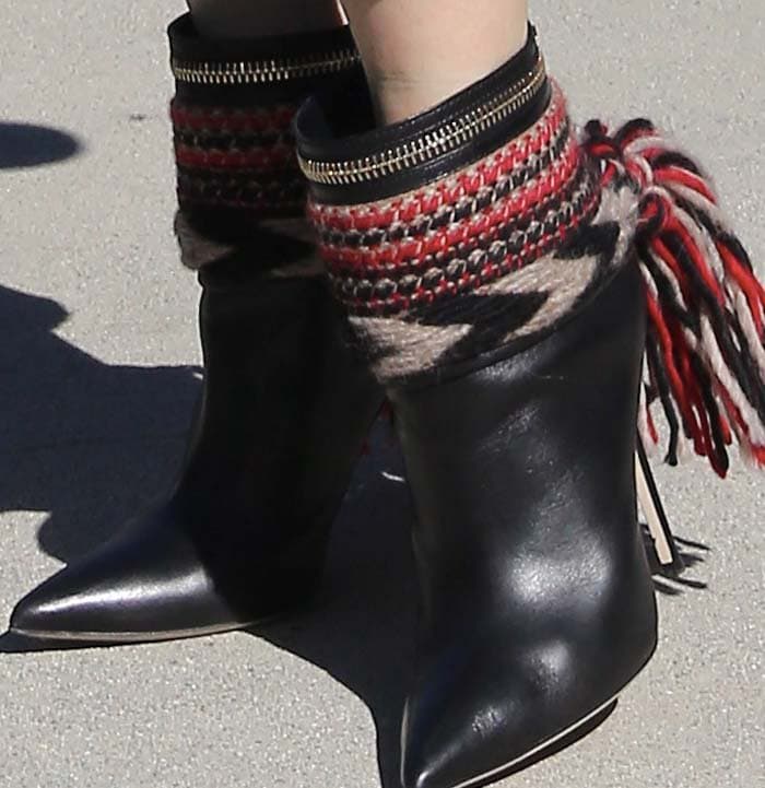 Gwen Stefani wore black eccentric boots from her own footwear label